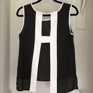 Open back black and white top